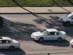Time lapse overhead shot, cars race right to left with stop and go traffic congestion on interstate highway. Stock Footage