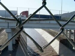 April 9 2009 MONTAGE Highway traffic at Mexican and US border, Juarez, Chihuahua, Mexico, AUDIO Stock Footage