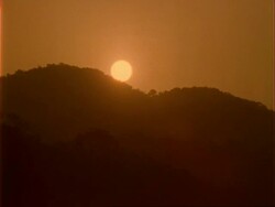 Sunsets behind rainforest horizon, WA, Panama. Stock Footage