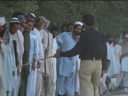 Long queues form for food aid at displaced persons camp News Clip