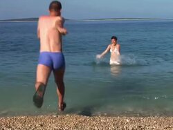 HD: Running Into The Water Stock Footage