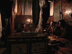 MS ZI Shot of several Tibetan Buddhist Lamas sitting and praying inside of Buddhist Temple / Lhasa, Tibet, China Stock Footage