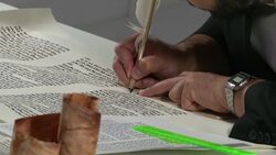 An exhibition featuring a robot writing Torah scrolls is on show at the Jewish museum in Berlin. Over the next six months the robot will work 10 hours a day to produce two scrolls, each 80 meters long, with the religious Jewish writings. (July 11) News Clip