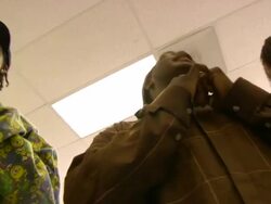 MS PAN Three young men rapping together under fluorescent lights  AUDIO / San Francisco, United States Stock Footage