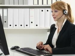 Female operator in office Stock Footage