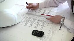 Architect Working With Blueprints Stock Footage