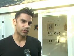 INTERVIEW: Reza Ali  on the event and his art at The Emoticon Project Celebration And Benefit Auction Stock Footage