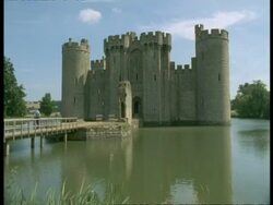 Bodiam Castle, Sussex - front view, bridge on river Rother leading to entrance Stock Footage
