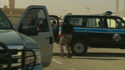 Armed soldiers force Arab protestors into the back of a truck. Stock Footage