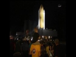 Shuttle Atlantis is now on the launch pad, in preparation for a July liftoff. This time lapse shows the 3.4 mile, 6 hour trek from Kennedy Space Center's vehicle assembly building to the launch pad in under two minutes. News Clip