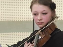 HD: Teenage Girl Playing Violin In Music Class Stock Footage