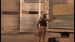 Pakistan - Suicide bomber rams compound of rival militant commander / Suicide bomber kills eight, including provincial govt minister / Curfew imposed after at least 10 killed in sectarian clashes / Aftermath of clashes between shiite and sunni muslims that left at least 10 dead / Suspected US drone strike outside remote tribal region kills six people / Imran Khan leads demonstration against drone strikes News Clip