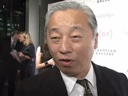 Bono and Damien Hirst Paint the Town Red For Aids In Africa - The (RED) Auction Stock Footage