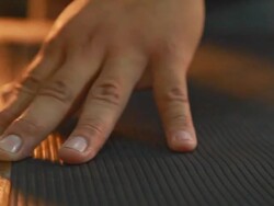 HD Dolly:Hands are black panel placed on the table. Stock Footage