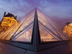 T/L Close up on the Louvre Pyramid at dusk / Paris, France Stock Footage