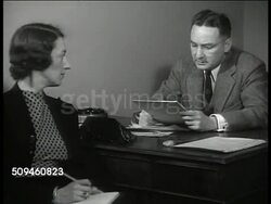 1939: U.S. FORTUNE SURVEY: LA MS Rockefeller Center building. INT MS Assistant taking notes w/ Fortune Magazine Analyst Elmer Roper (1900-1971) at desk. CU 'Fortune Survey.' CU Files in card box 'Fortune Survey.' New York City. Instructional Video