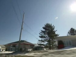 MS Side POV Shot of suburban residential street / Quebec, Canada Stock Footage