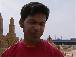 Weather dampens spirits at sand sculpture festival News Clip