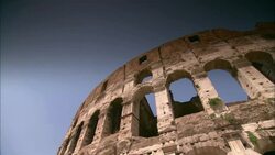 Blue sky shows through the arched windows of the Roman Colosseum. Stock Footage