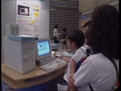 SINGAPORE: WTO: DISCUSSIONS ON ABOLISHING TARIFFS ON COMPUTERS News Clip