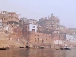 WS POV View of temples and buildings at Ganges River / Varanasi, Uttar Pradesh, India Stock Footage