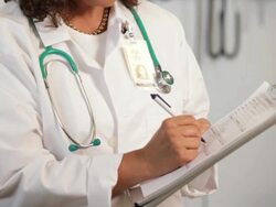 "TU doctors writing a medical chart/Richmond,Virginia, USA" Stock Footage