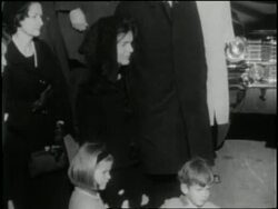 Jacqueline Kennedy holds her children's hands during the funeral of her husband, U.S. President John F. Kennedy. News Clip