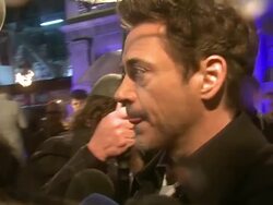 INTERVIEW: Robert Downey Jr. on being on set,dressing in drag, the pressure of the sequel, Iron Man 3, audience feedback at the Sherlock Holmes: A Game Of Shadows: European Premiere at Empire Leicester Square on December 08, 2011 in London, England Stock Footage