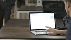 Two young entrepreneur businessmen working late in the office Stock Footage