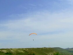 Paraglider in Mountain Stock Footage