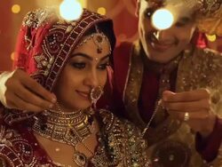 Groom wearing necklace to his wife  Stock Footage