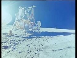 Astronaut stepping on to lunar surface from lunar module, Apollo 14 Stock Footage