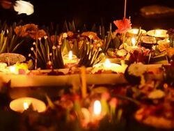 Kratongs is on riverside in Loy Krathong festival day Stock Footage