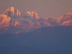 T/L evening light fading over Himalayan peak, India Stock Footage