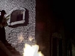 A man burns the writings of Nostradamus in a fire. Stock Footage