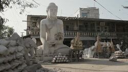 WS, PAN A street in the Buddha and stone carving district of Mandalay / Mandalay, Myanmar Stock Footage