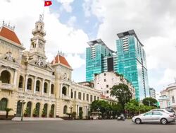 MS T/L TU Shot of traffic in front of Ho Chi Minh City Hall / Ho Chi Minh City, Southeastern, Vietnam Stock Footage