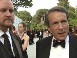 INTERVIEW: amfAR CEO Kevin Frost, L'Oreal President Consumer Products Division Worldwide Jean-Jacques Lebel on L'Oreal's partnership at the amfAR Gala Red Carpet Arrivals : 64th Cannes Film Festival at Antibes . (Footage by WireImage Video/GettyImages) Stock Footage