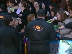 Rupert Grint signing autographs at the Premiere of Harry Potter and the Chamber of Secrets. News Clip