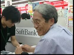 WRAP Hong Kong queues as iPhone goes on sale; AP pix from Tokyo News Clip