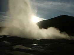MS Silouette of geothermal steam blowing past Strokkur geyser and geyser erupting in Geysir Park / Haukadalur, Haukadalur, Iceland Stock Footage