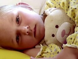 Little girl lying sick in her bed. Stock Footage