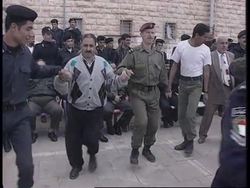 WEST BANK: POLICEMEN DISPLAY SKILLS AT OFFICIAL GRADUATION CEREMONY News Clip