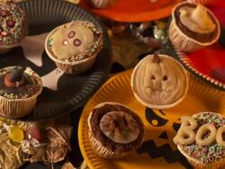 HD DOLLY: Eating Halloween Cupcake Stock Footage