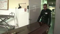 VOICED : Volunteer mourners give faceless Lisbon dead final send off News Clip