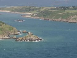 WS AERIAL ZO Shot of light house and sea / Guernsey, Channel Isles Stock Footage