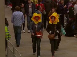 ATMOSPHERE: Crowd wearing fancy dress at the Royal Wedding Procession Cenotaph Whitehall at London England. (Footage by WireImage Video/GettyImages) Stock Footage