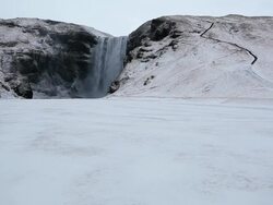 WS View of Snow covers area around waterfall / Iceland  Stock Footage