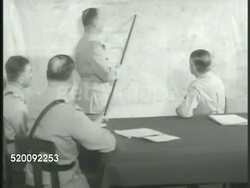 1948: GREEK GENERALS & OFFICERS: INT VS Greek Generals & Officers pointing to map in meeting. MS Officer talking. MS General talking, pointing to map w/ stick. Athens, Greece, Cold War Instructional Video