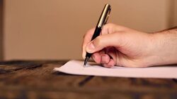 Human hand writing a letter Stock Footage